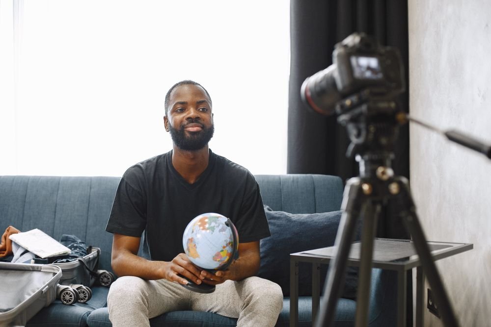 Creator filming video content in a home studio